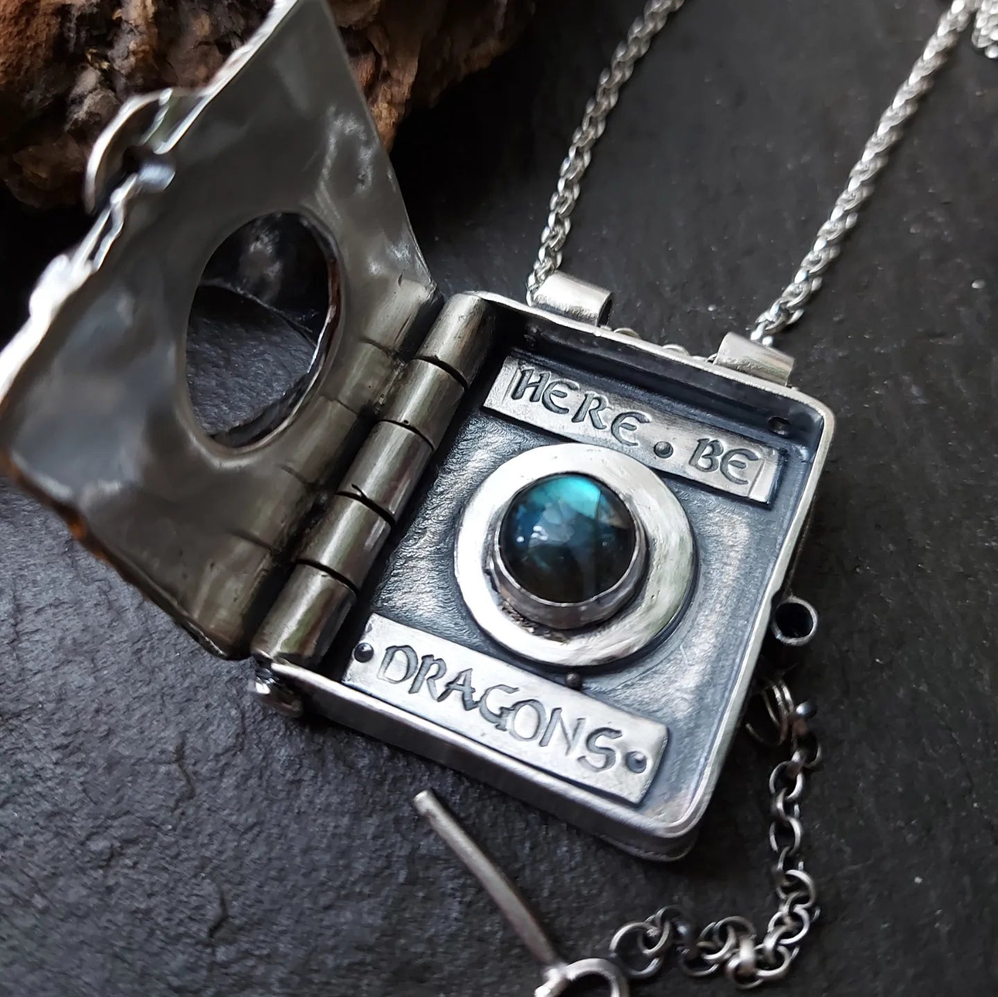 Sterling silver dragons eye locket