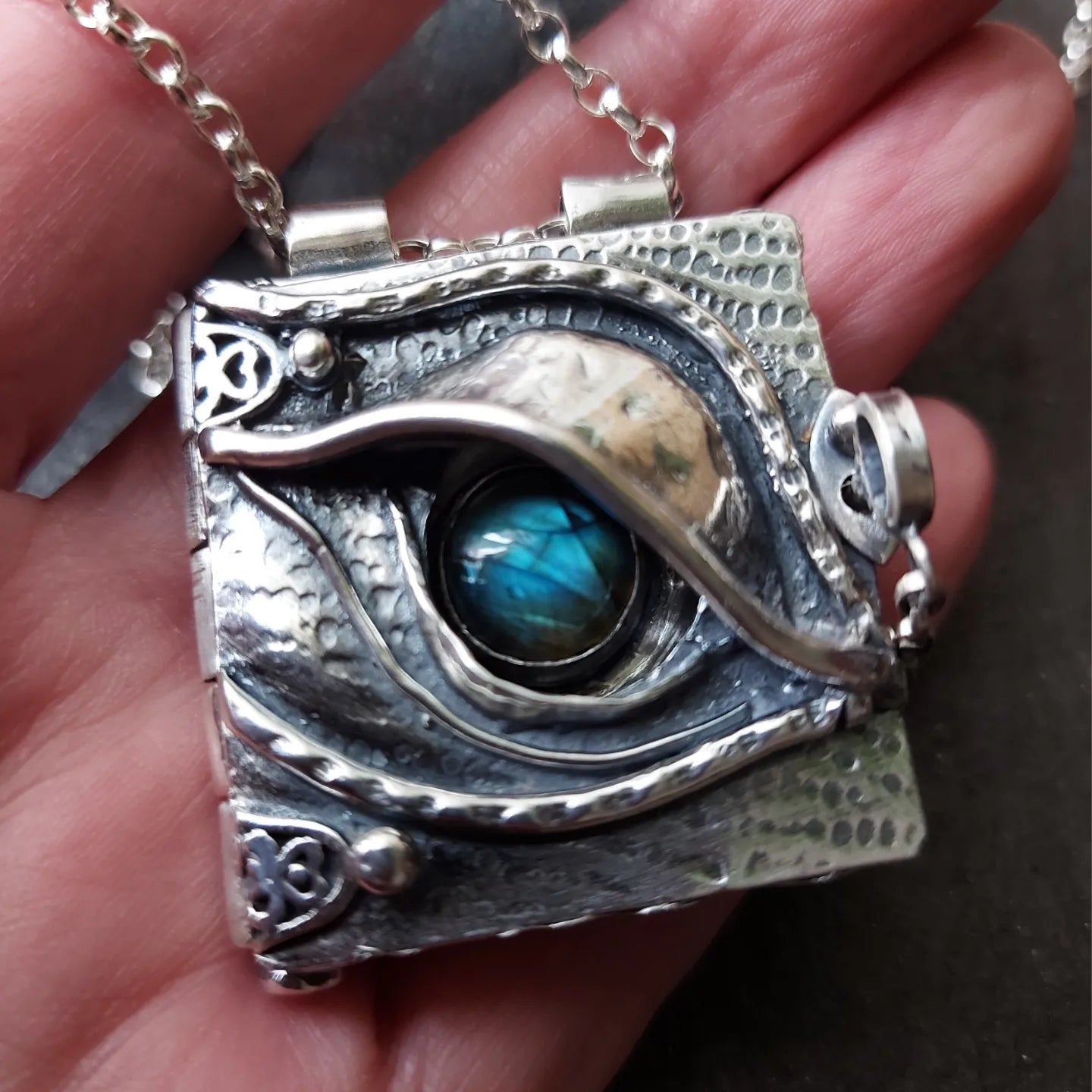 Sterling silver dragons eye locket