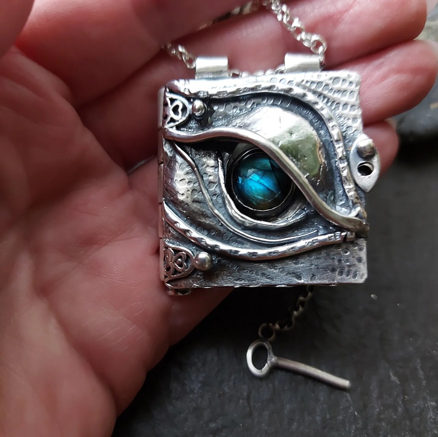 Sterling silver dragons eye locket