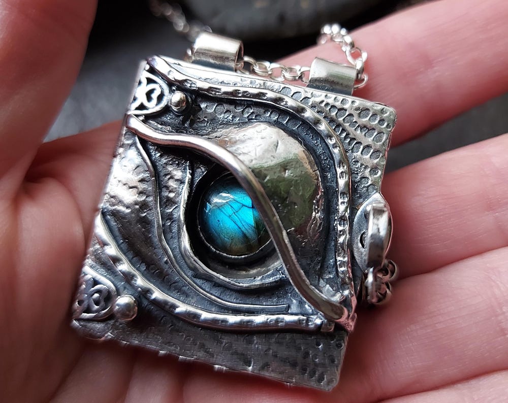 Sterling silver dragons eye locket
