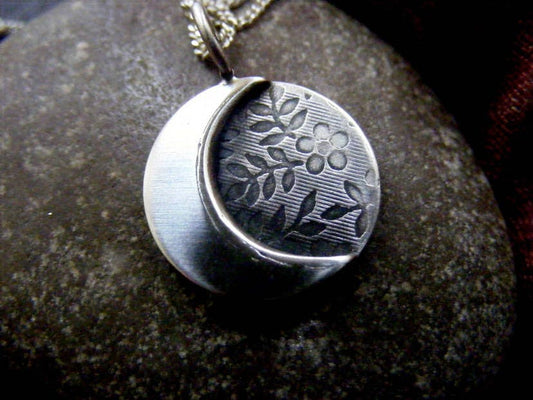 Silver moon necklace with flower texture background , small crescent  moon pendant