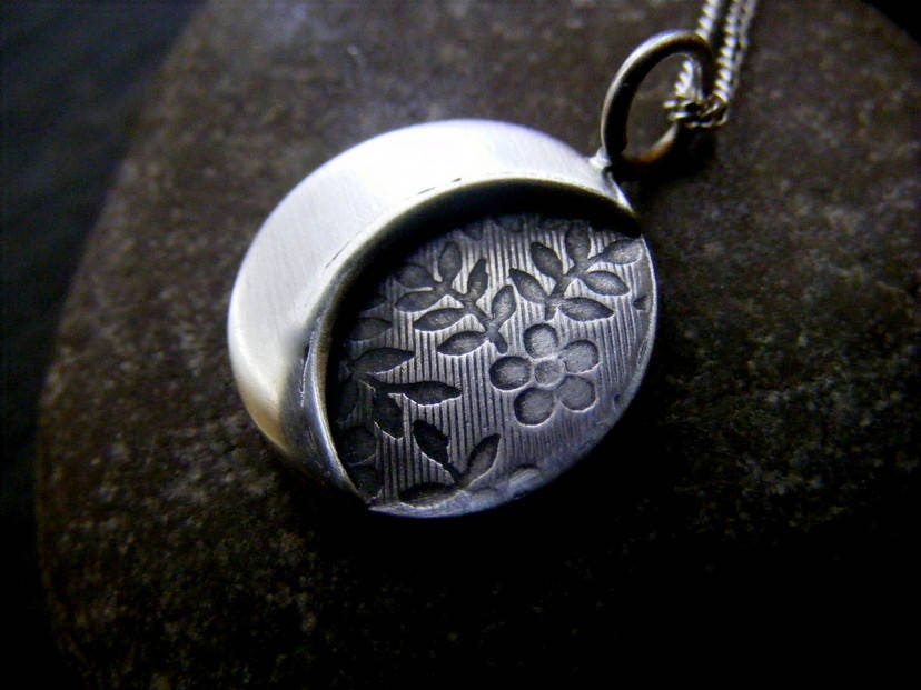 Silver moon necklace with flower texture background , small crescent  moon pendant