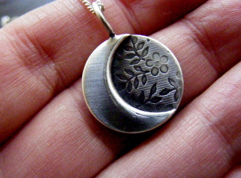 Silver moon necklace with flower texture background , small crescent  moon pendant