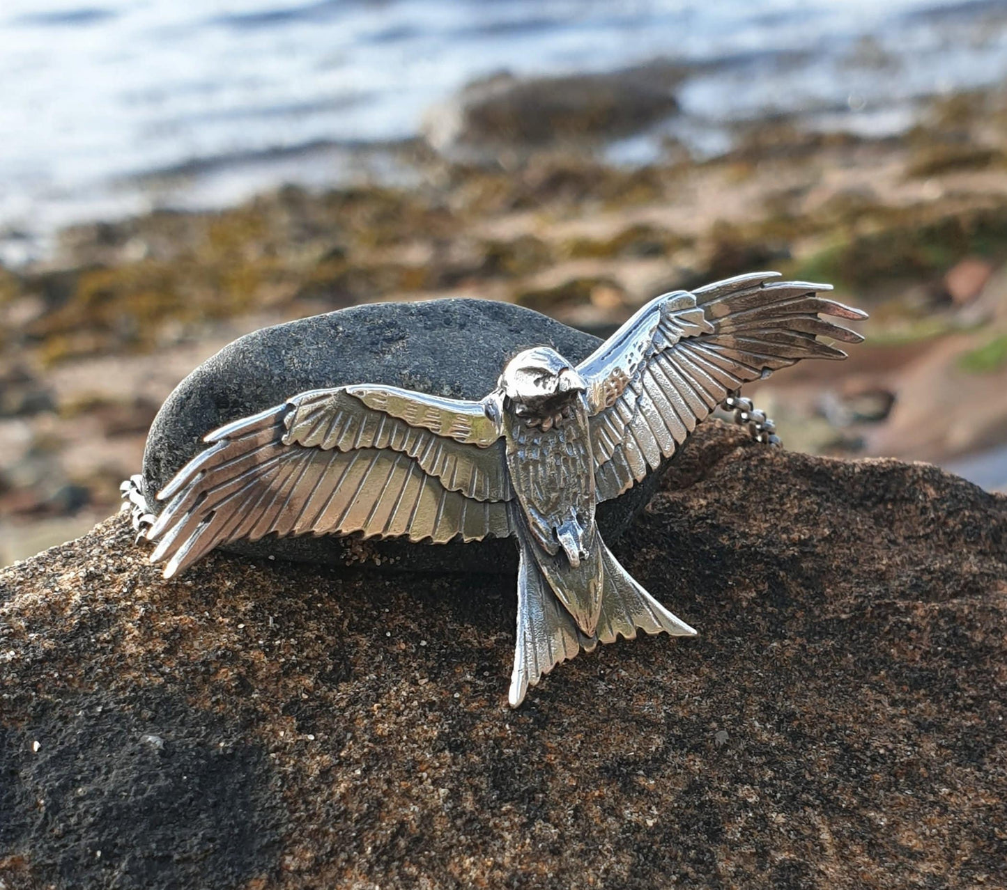 Silver Handmade eagle , red kite pendant , flying sterling eagle necklace with textured details