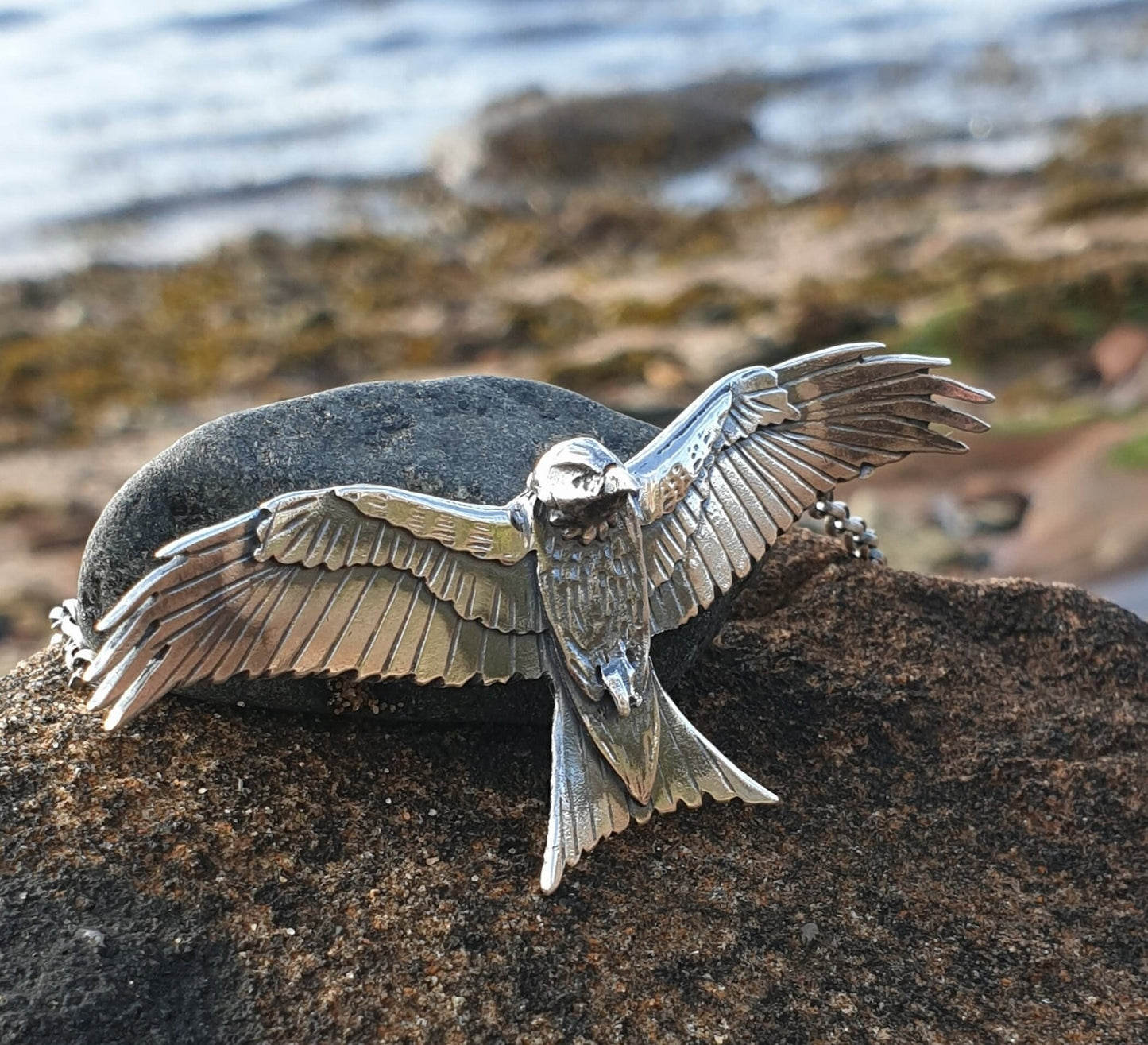 Silver Handmade eagle , red kite pendant , flying sterling eagle necklace with textured details