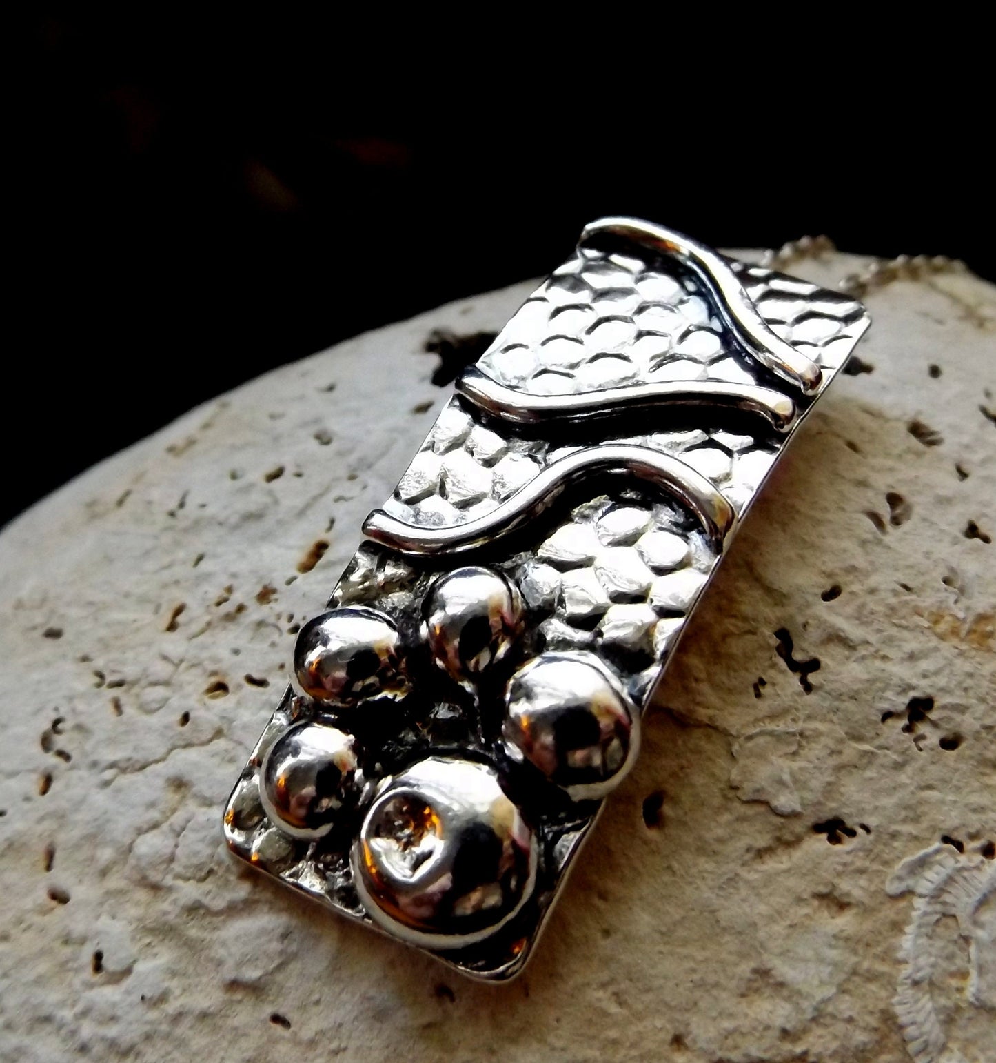 Silver pebble and wave textured sea lover pendant necklace