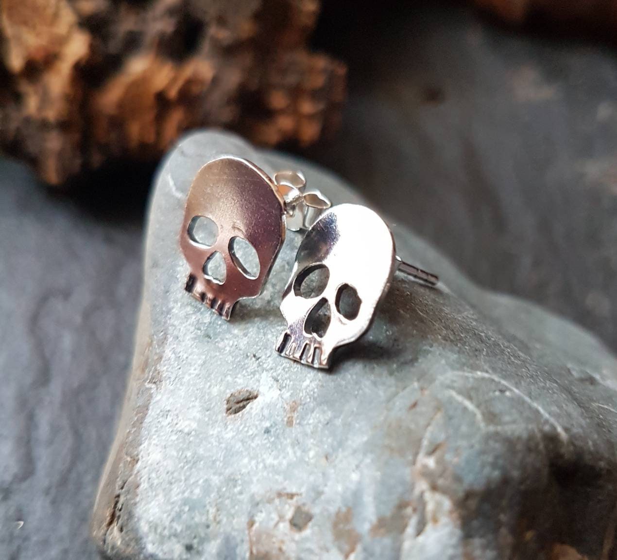 Silver skull stud post earrings , mismatched quirky skull earrings