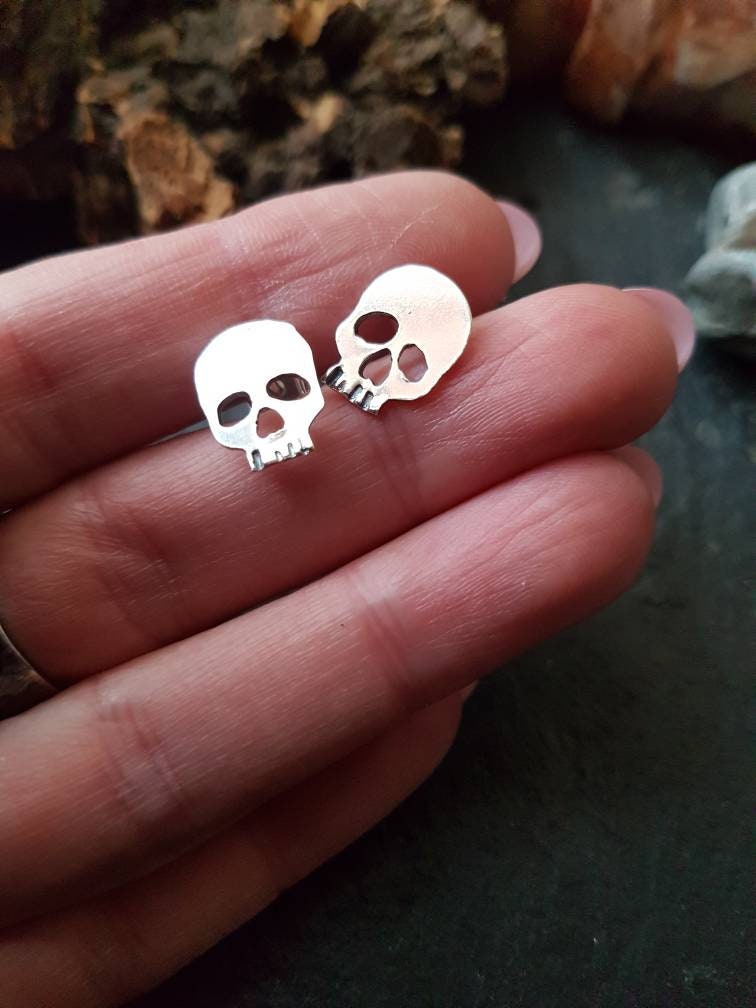 Silver skull stud post earrings , mismatched quirky skull earrings