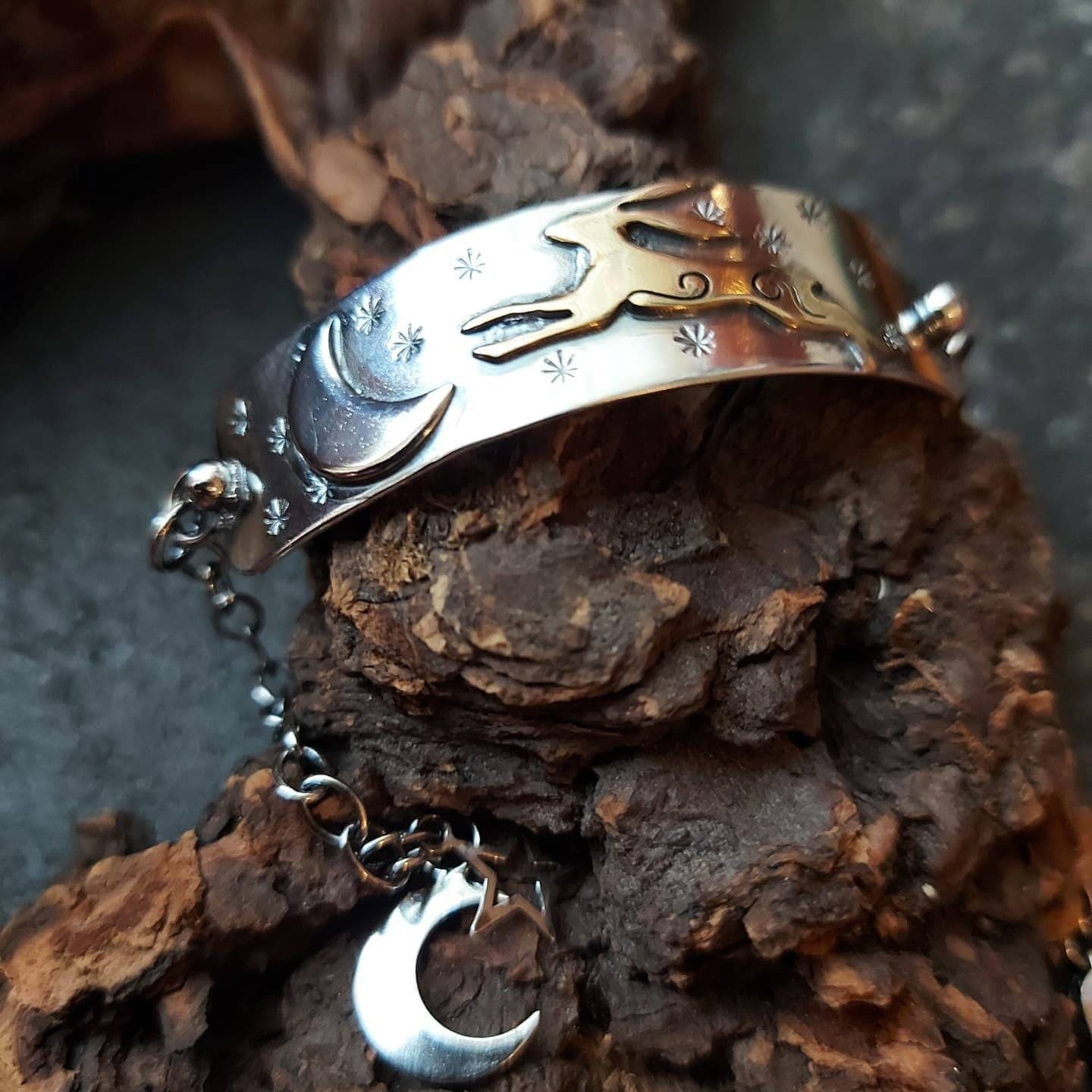 Silver leaping hare with Moon and Stars bar bracelet with star and moon charms, and brass hare