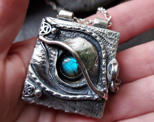 Sterling silver dragons eye locket